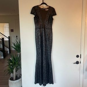 Wore once for a wedding and no longer wear this size dress.